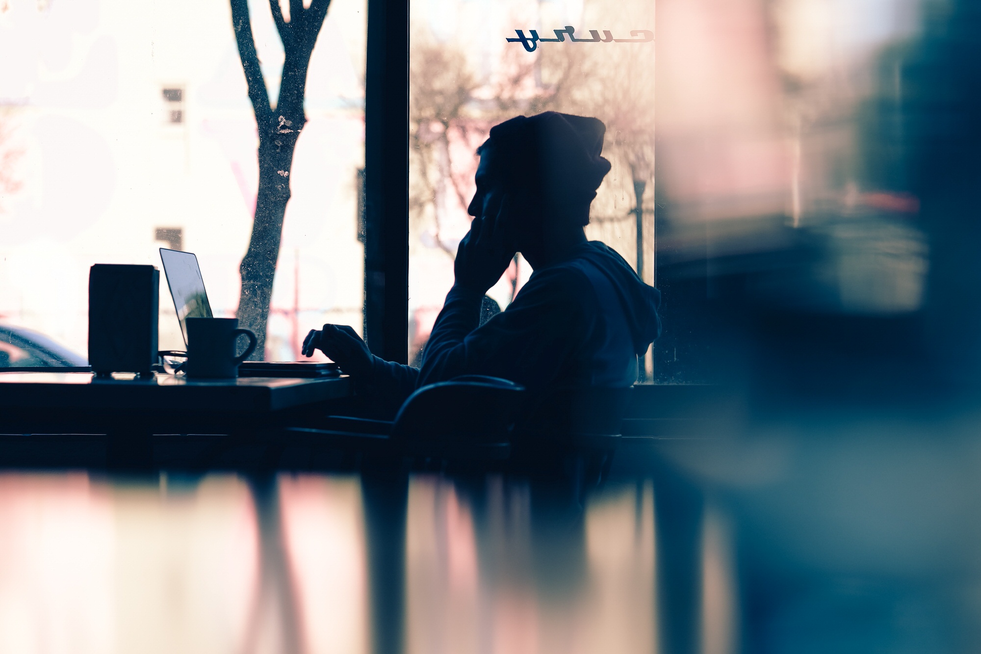 Person Sitting and Working Person Sitting and Working